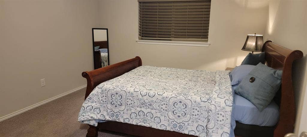 Private furnished bedroom with shar