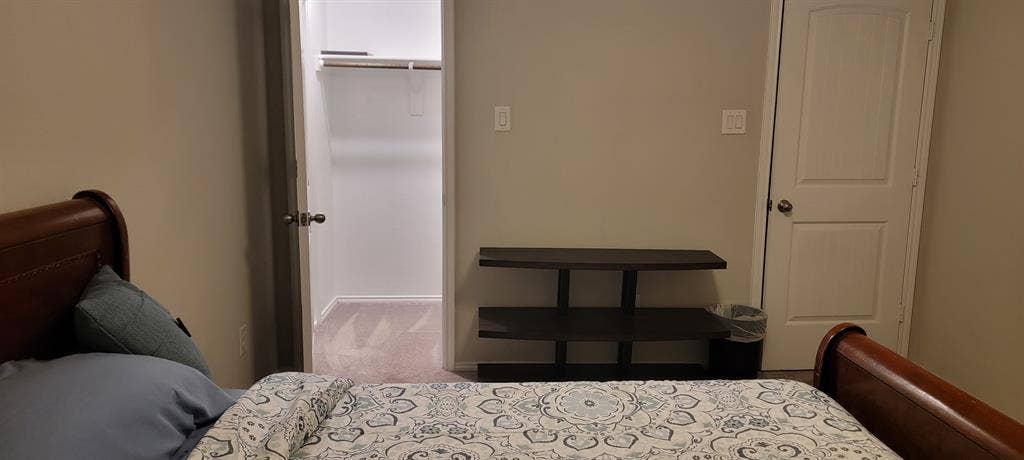 Private furnished bedroom with shar