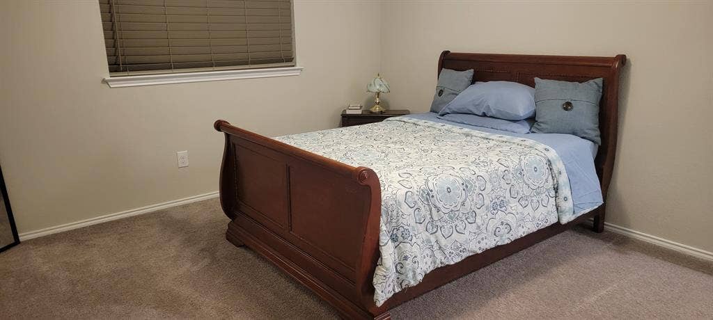 Private furnished bedroom with shar