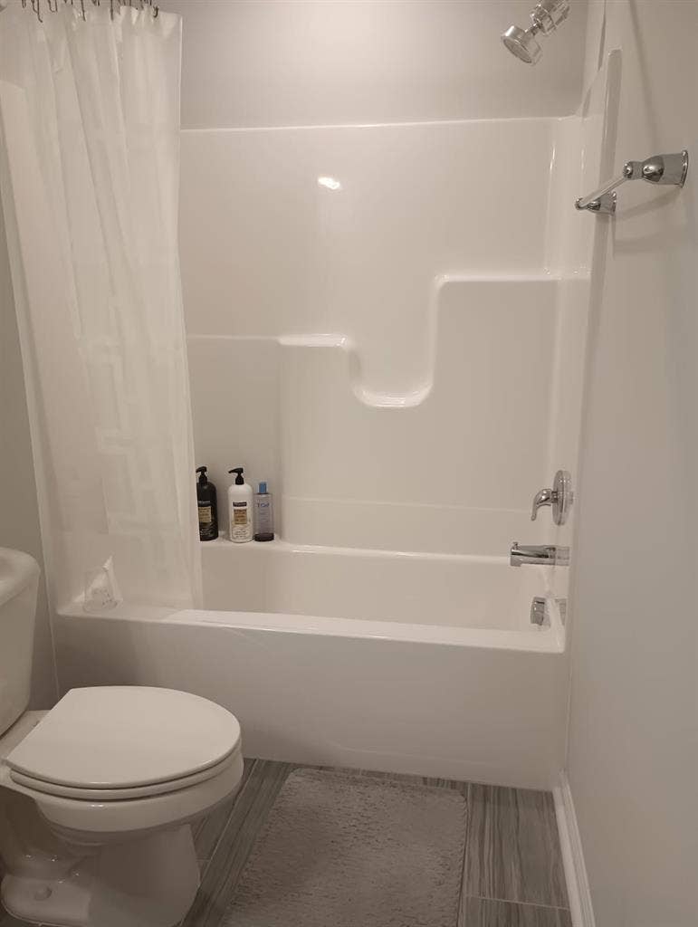 Room with shared bathroom