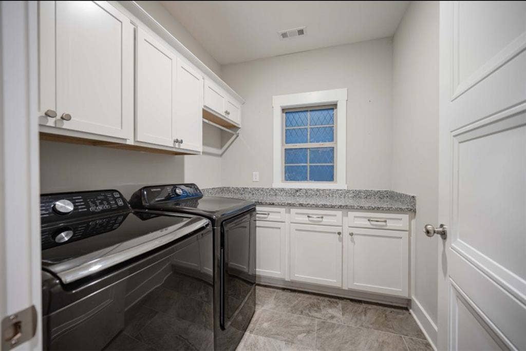 Furnished bedroom with large bath