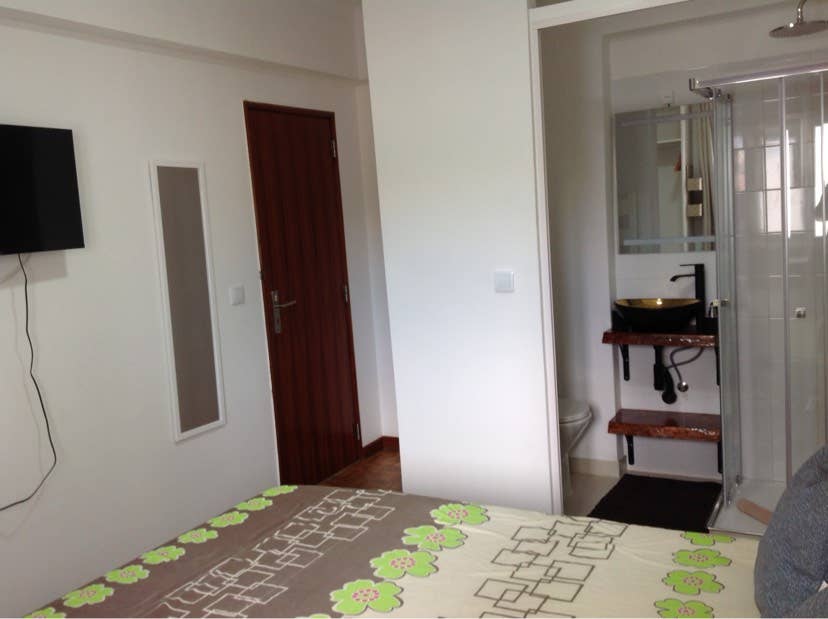 bedroom with private bathroom