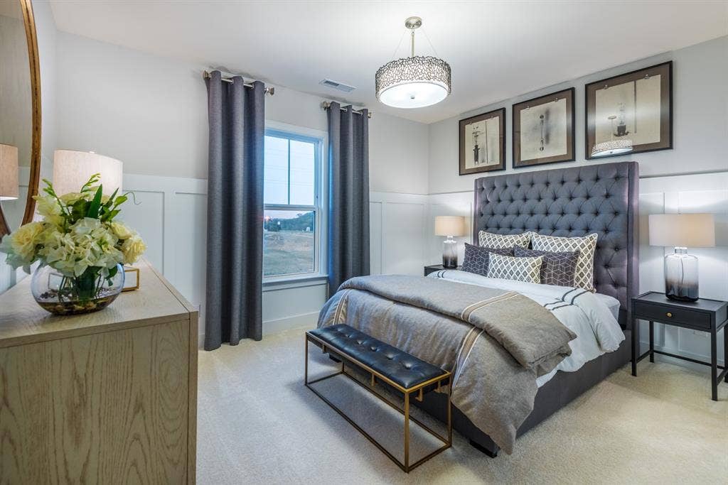 Furnished bedroom with private bath