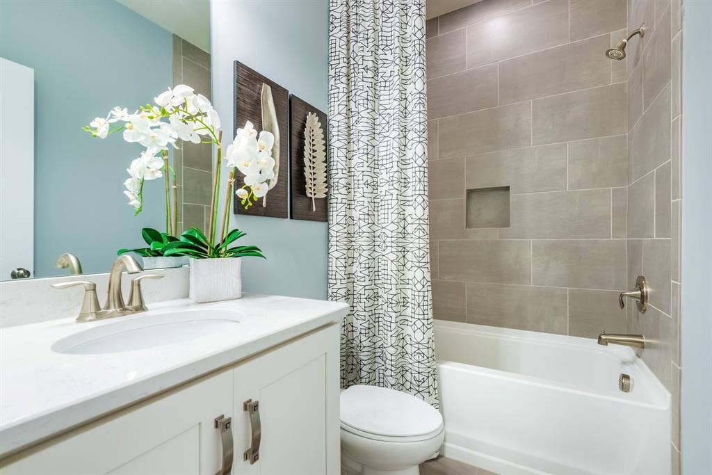 Furnished bedroom with private bath