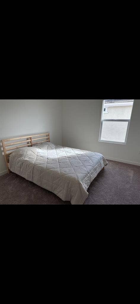 Furnished queen bedroom