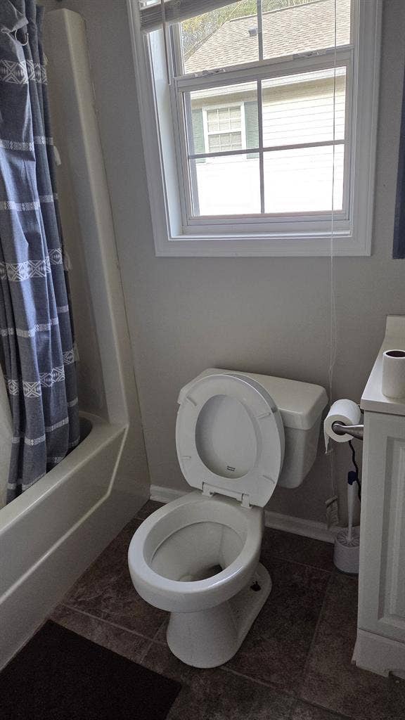 Room with private detached bathroom