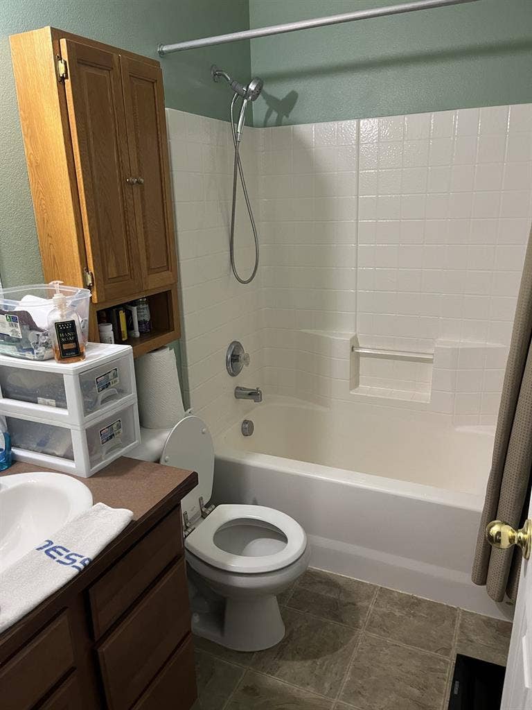 Furnished bedroom private bathroom.