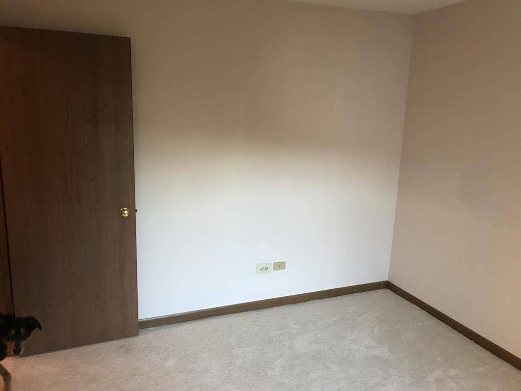 Furnished bedroom w/ walk in closet