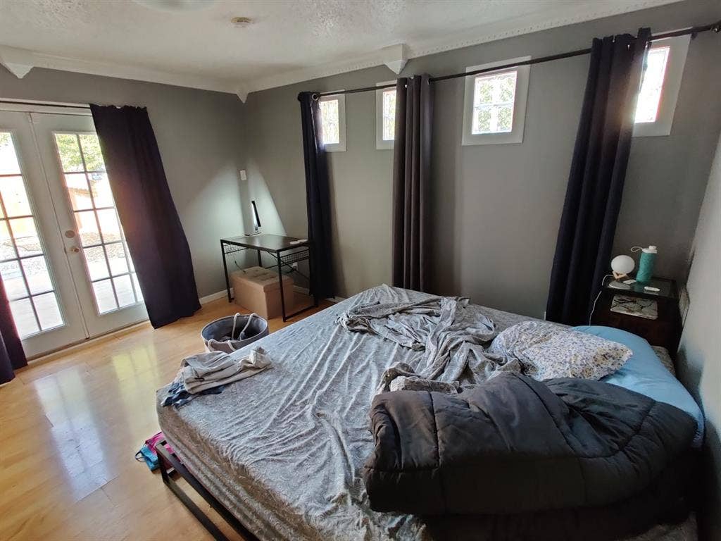 Master bedroom in a 3-br 2-ba house