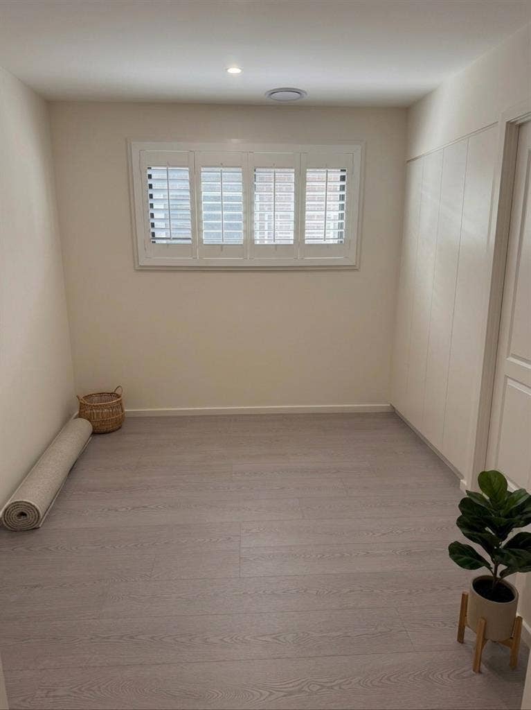 A room with separate bathroom