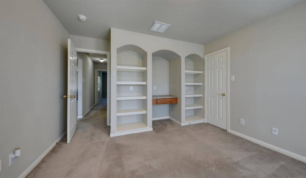 Room with built ins & bed