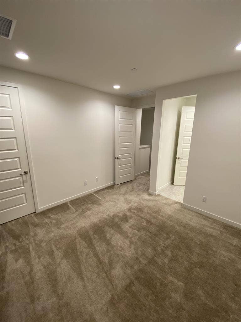 Master bedroom w/ ensuite bathroom
