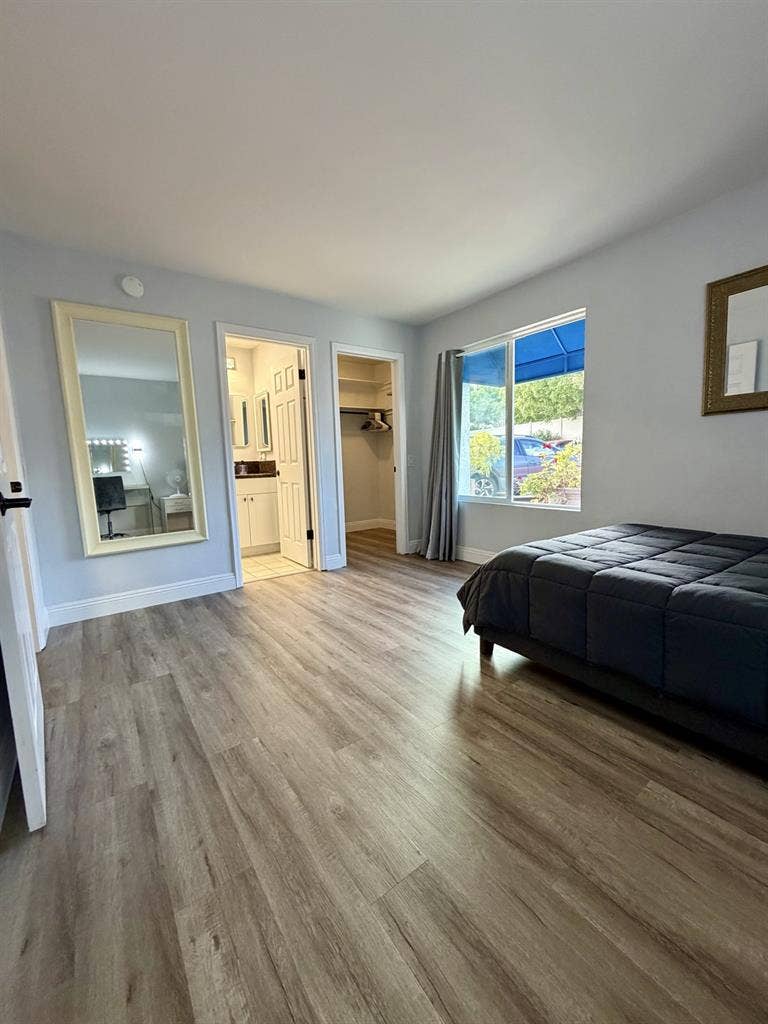 Primary bedroom + bath in UTC
