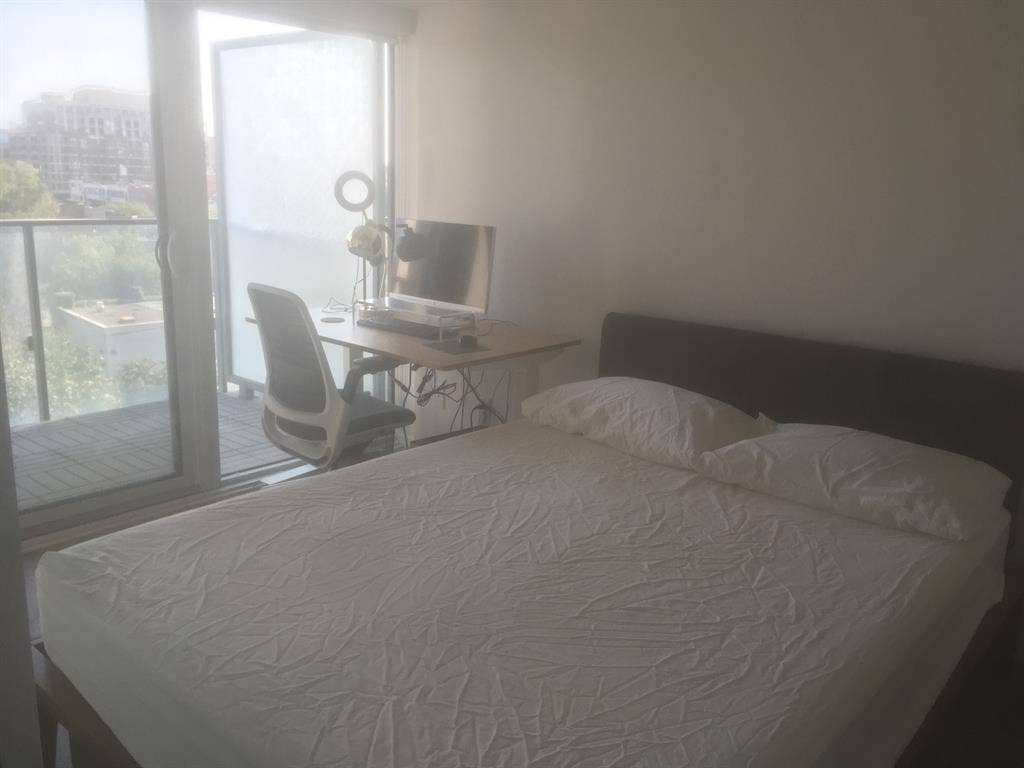 Furnished bedroom with ensuite bath