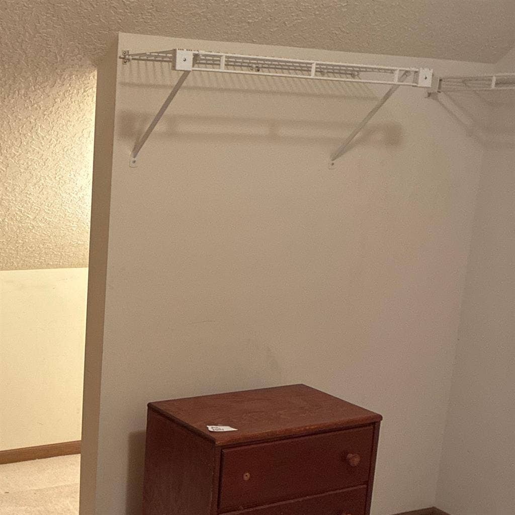 Upstairs bedroom with full bathroom