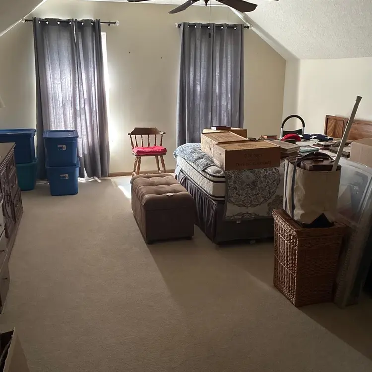 Upstairs bedroom with full bathroom