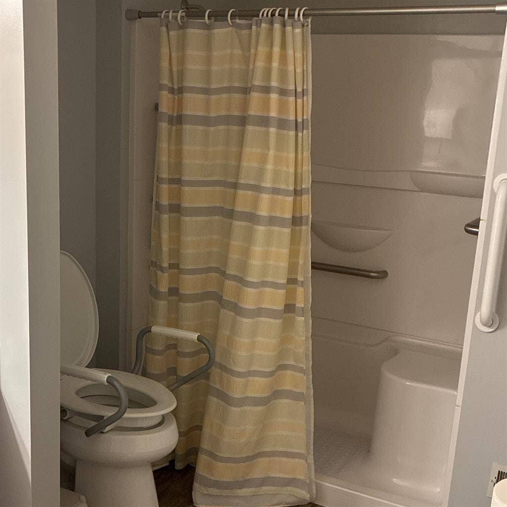 Upstairs bedroom with full bathroom
