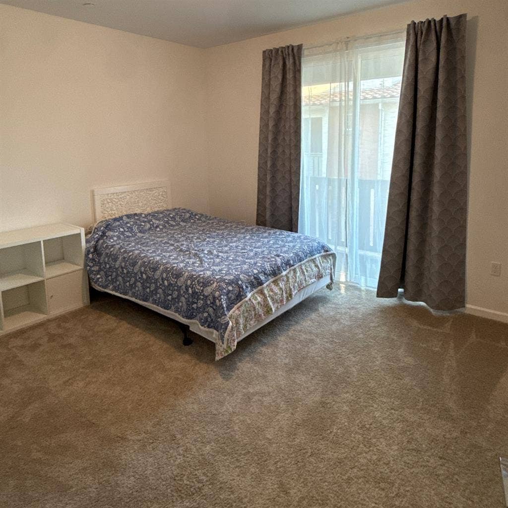 Large master bedroom in a new house