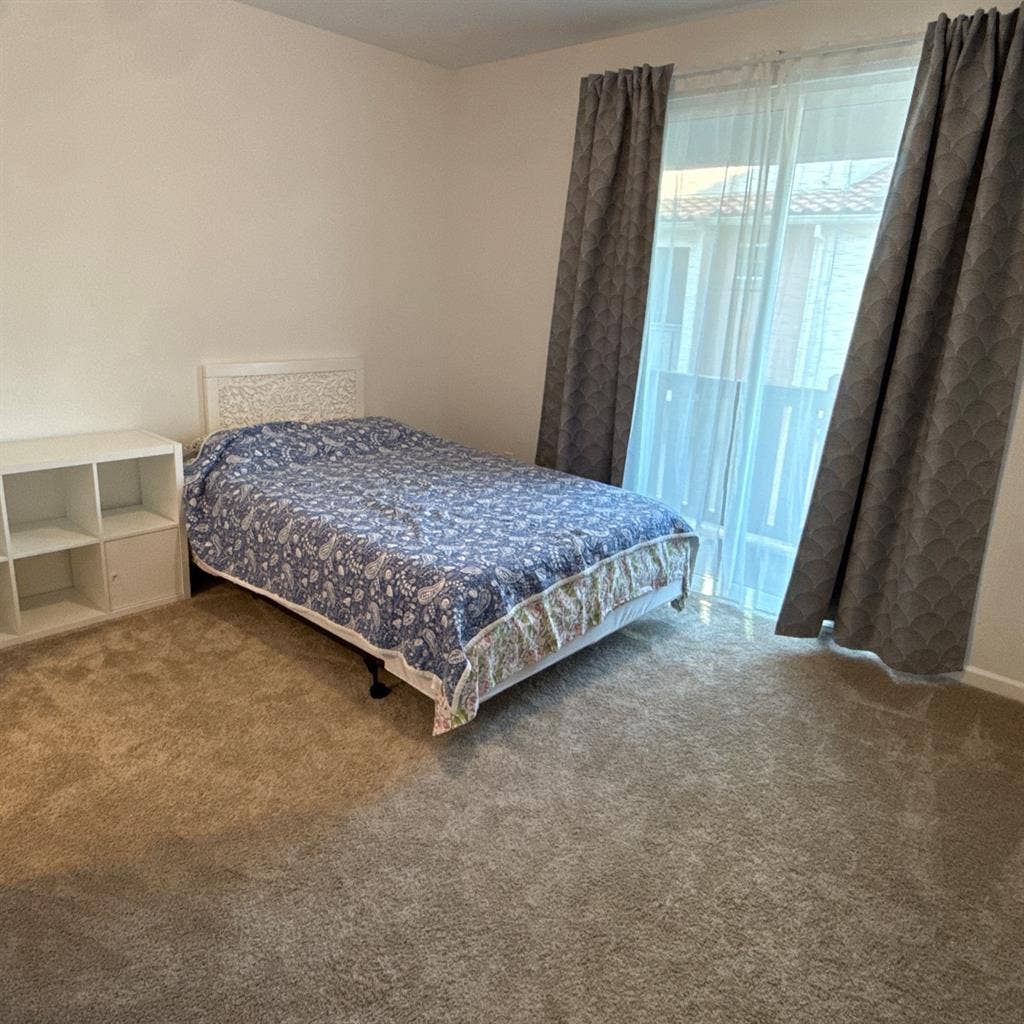 Large master bedroom in a new house