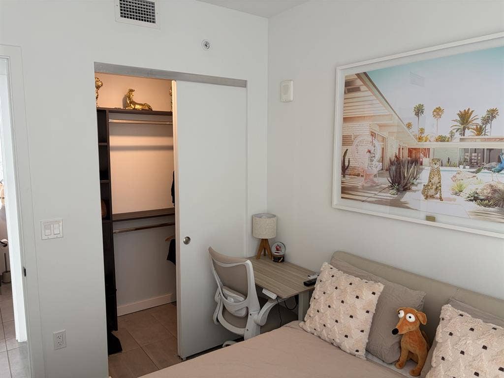 A room in a 1-bedroom apartment.