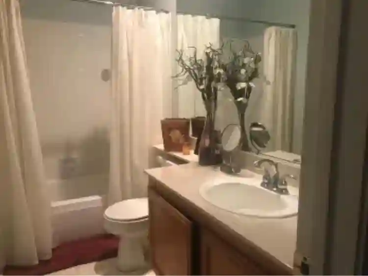 Medium size bedroom with windows