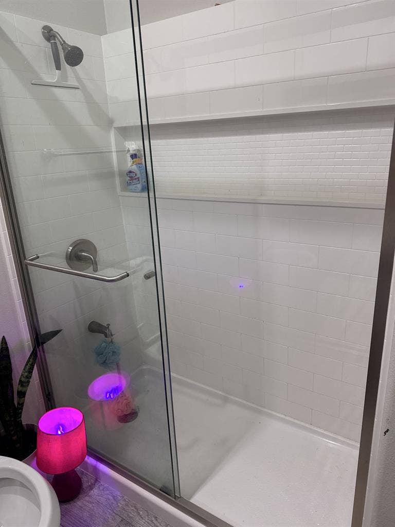 Room with private detached bathroom