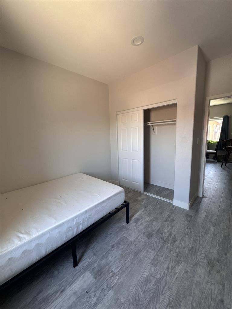 Room with private detached bathroom