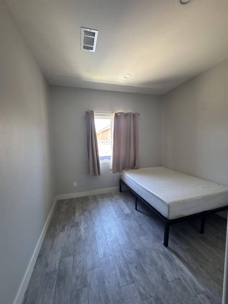 Room with private detached bathroom