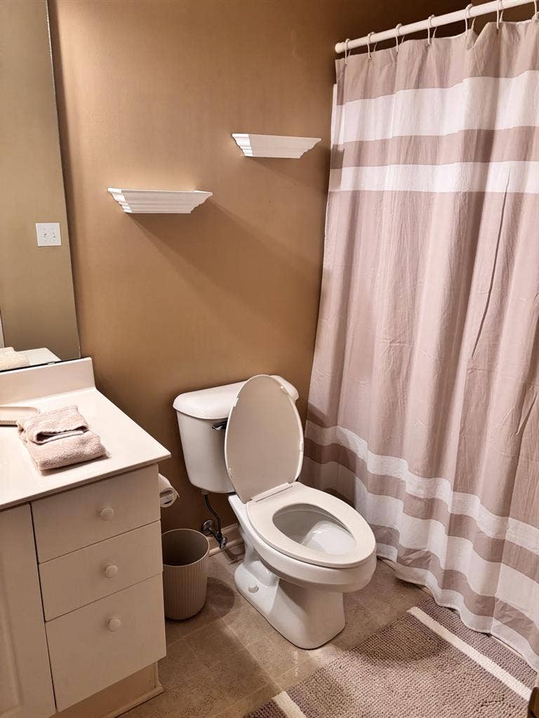 Bedroom with shared bathroom