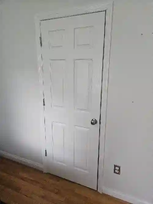 Well lit room with hardwood.