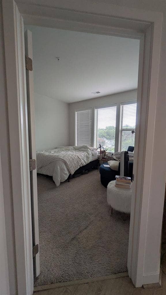 Primary bedroom w/ private bath