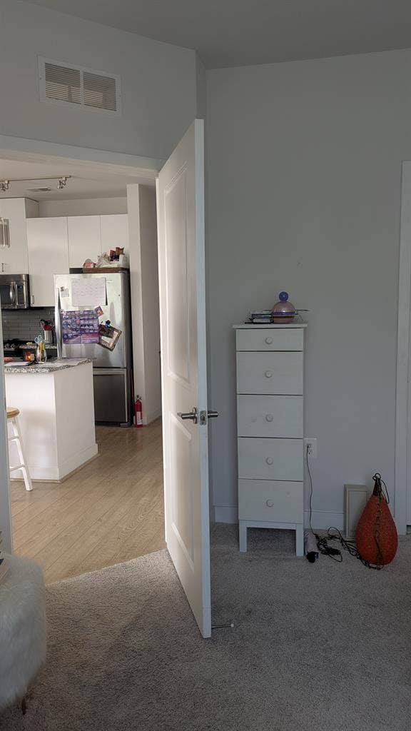 Primary bedroom w/ private bath