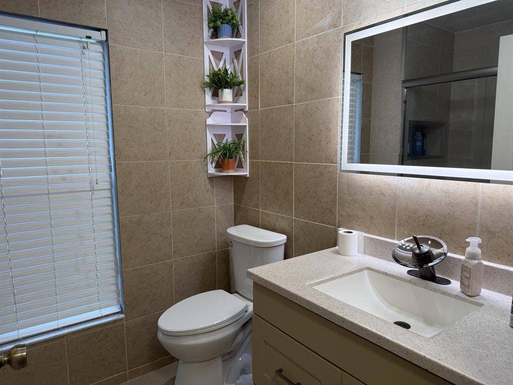 Room with a shared bathroom.