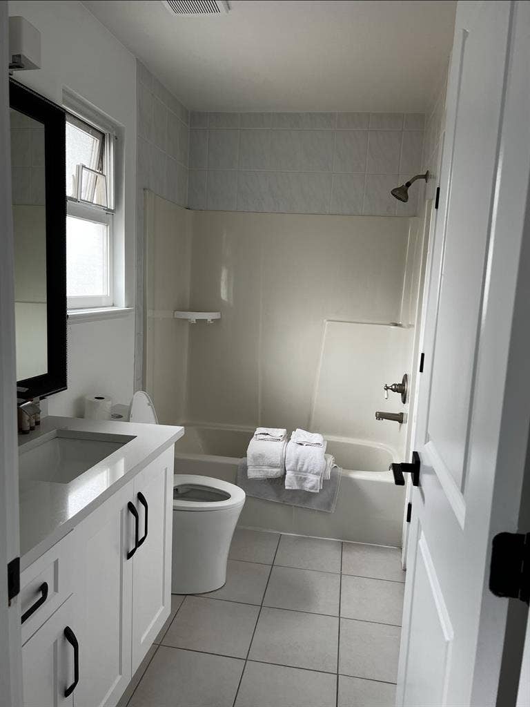 large bedroom with bathroom