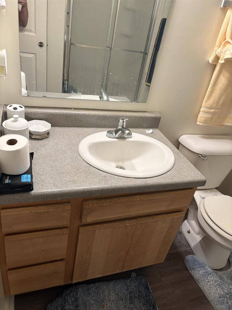 Bedroom with bed & private bathroom