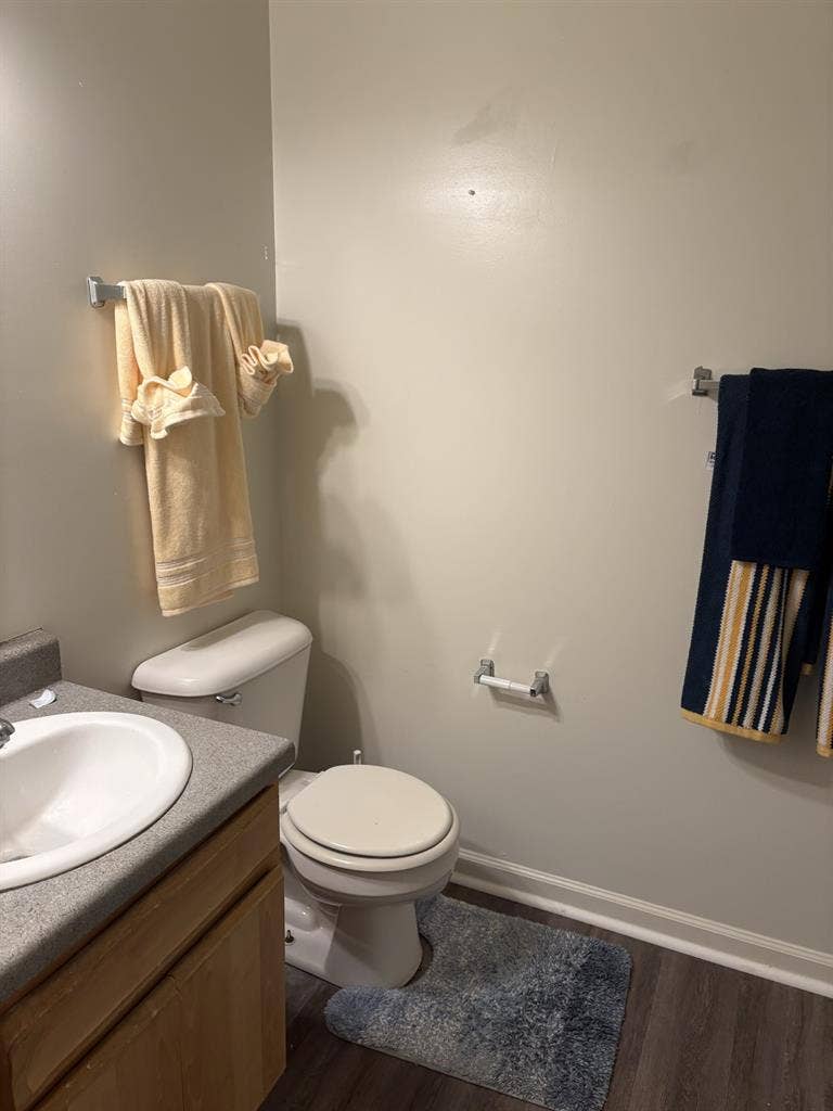 Bedroom with bed & private bathroom