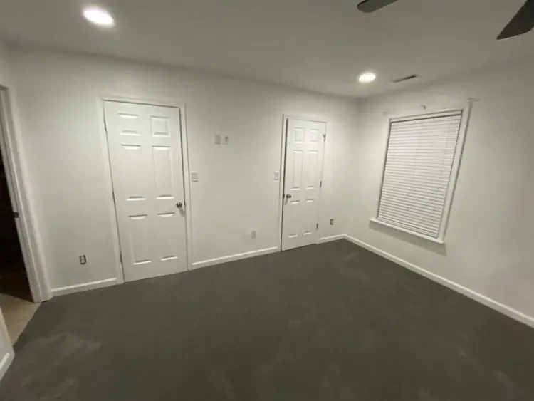 One bedroom with shared bathroom