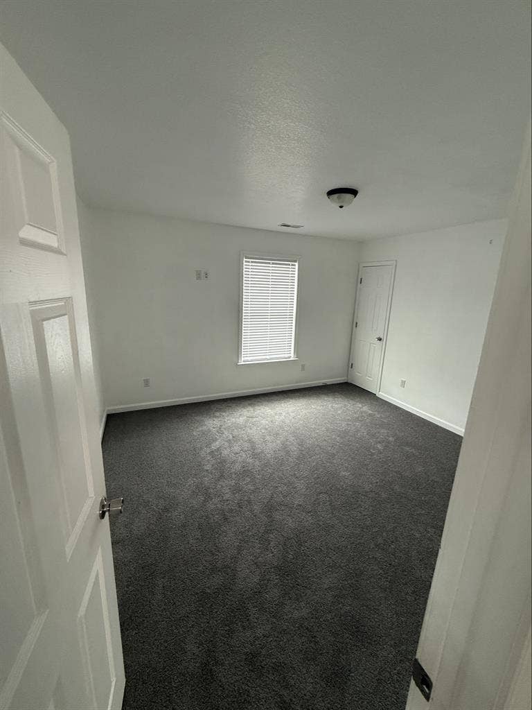 One bedroom with shared bathroom