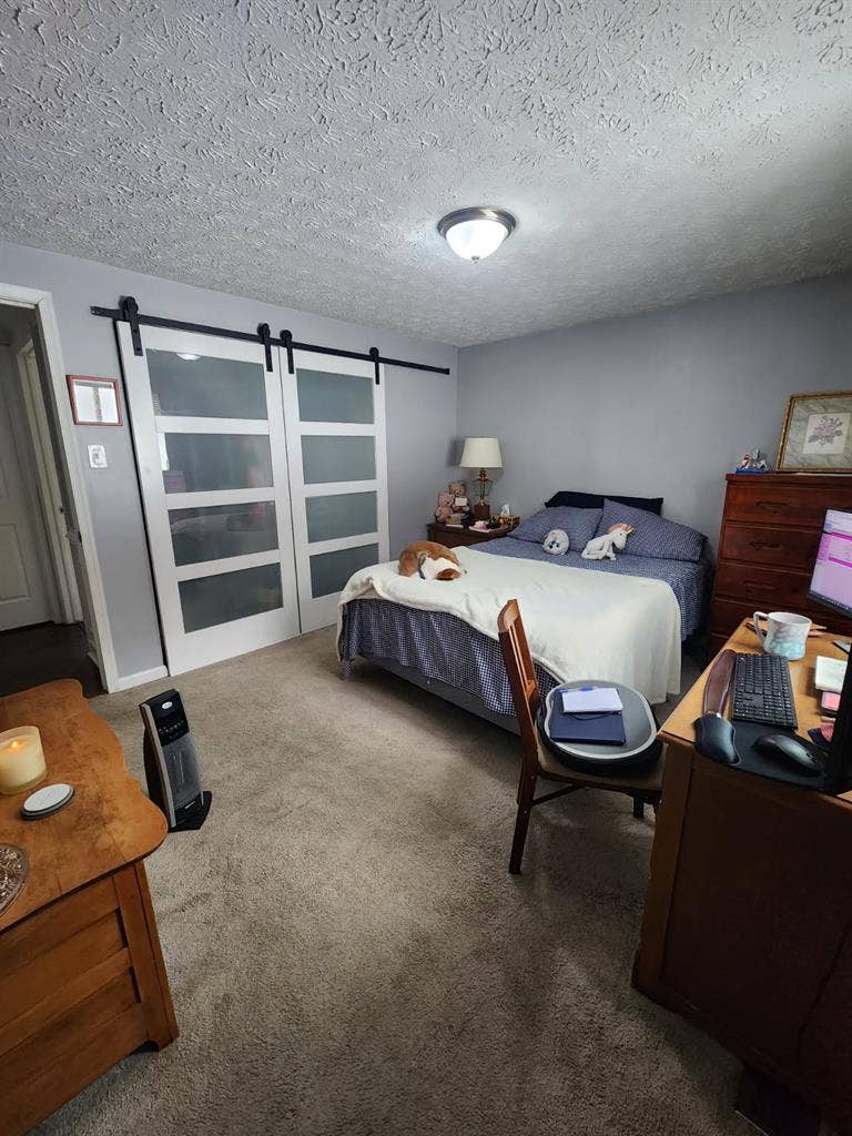 Master bedroom w/ private bathroom