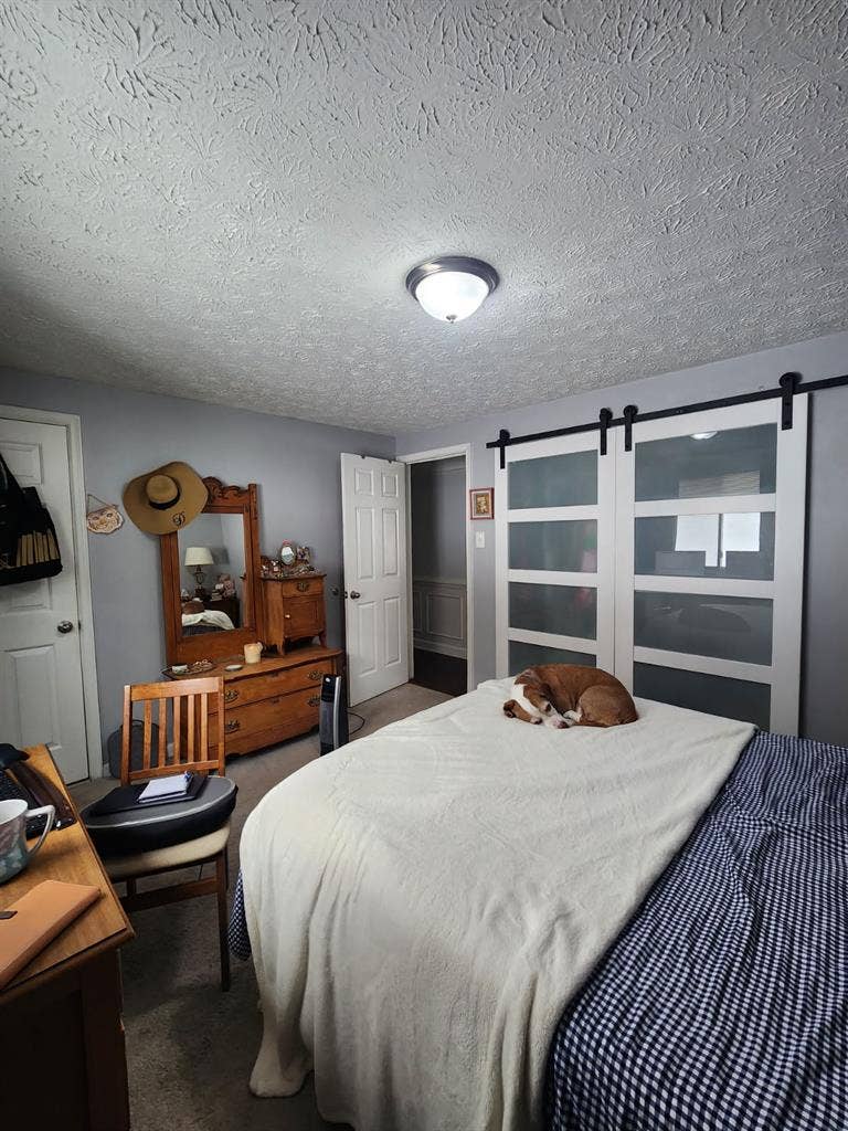 Master bedroom w/ private bathroom
