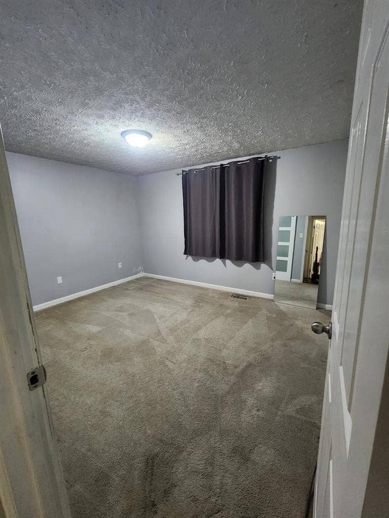 Master bedroom w/ private bathroom