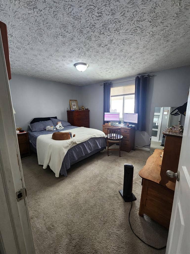 Master bedroom w/ private bathroom
