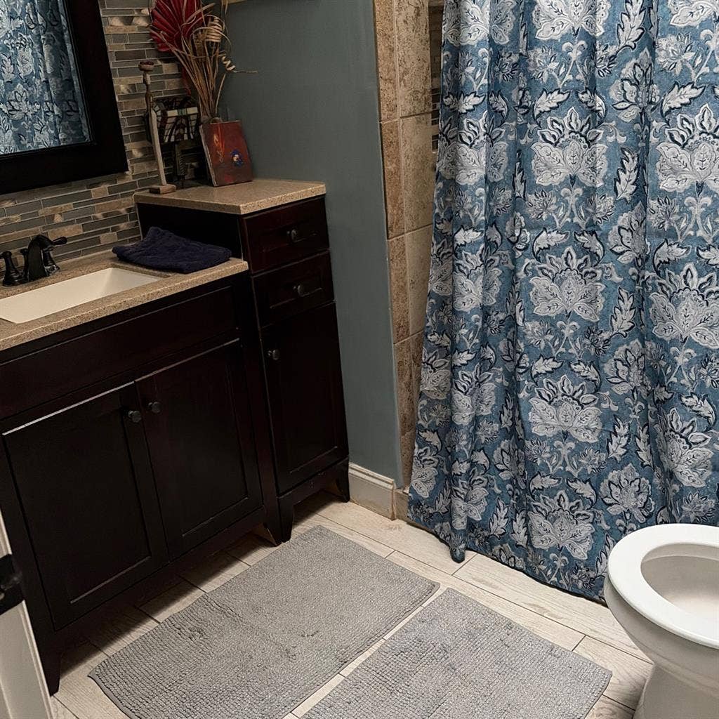 Bedroom with shared bathroom