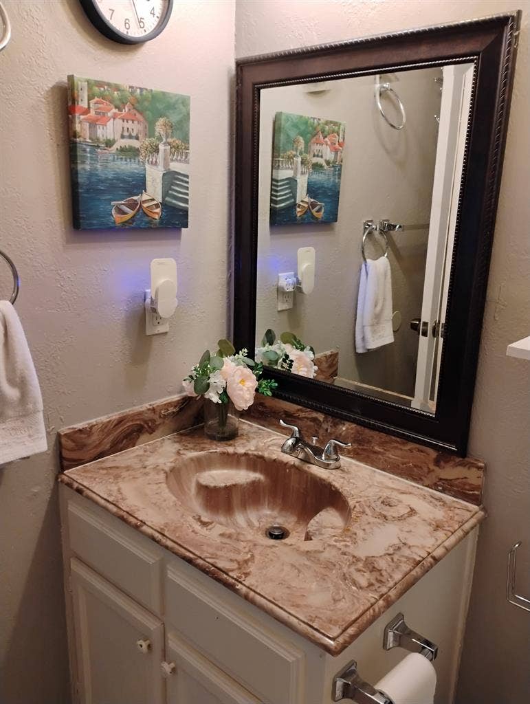 Master bedroom with a private bath.