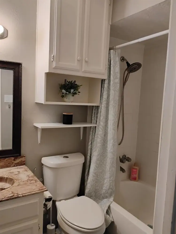 Master bedroom with a private bath.