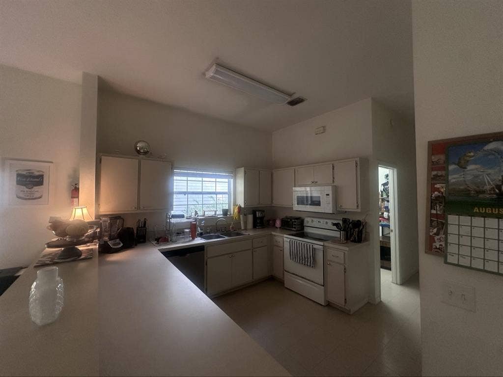 Room in house, 3 other girls.