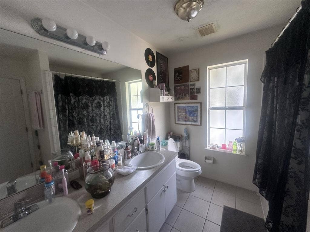 Room in house, 3 other girls.