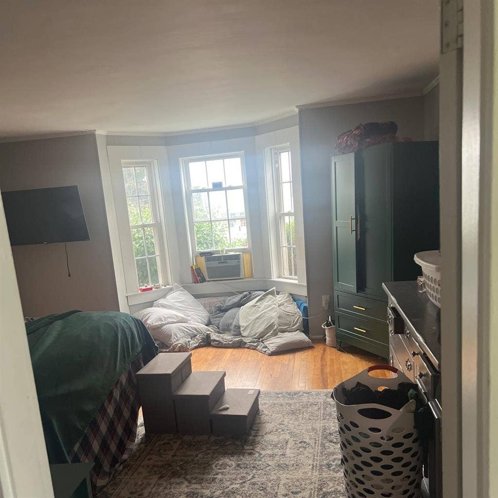 Large bedroom with lots of lighting