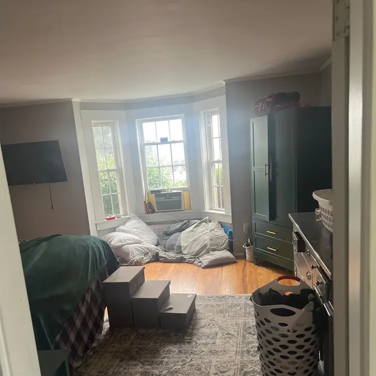 Large bedroom with lots of lighting