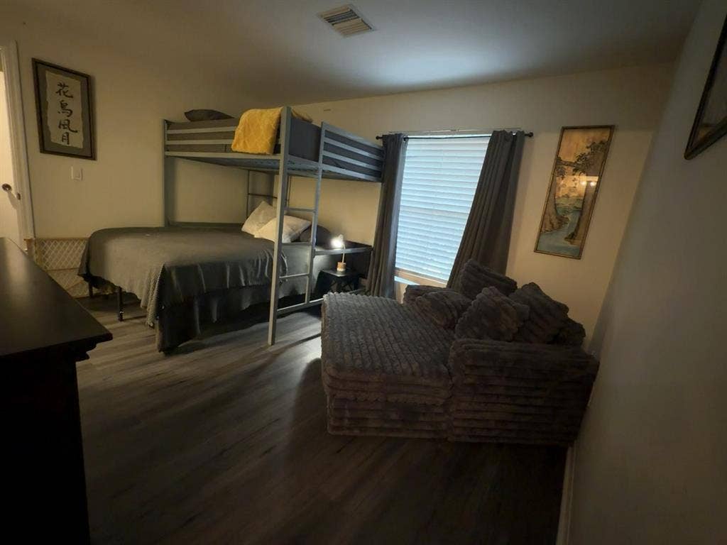 Furnished bedroom with bathroom